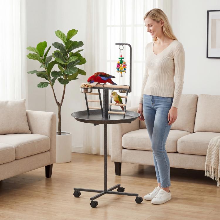 Bird play center with round tray, wood perch, and climbing ladder on wheeled stand