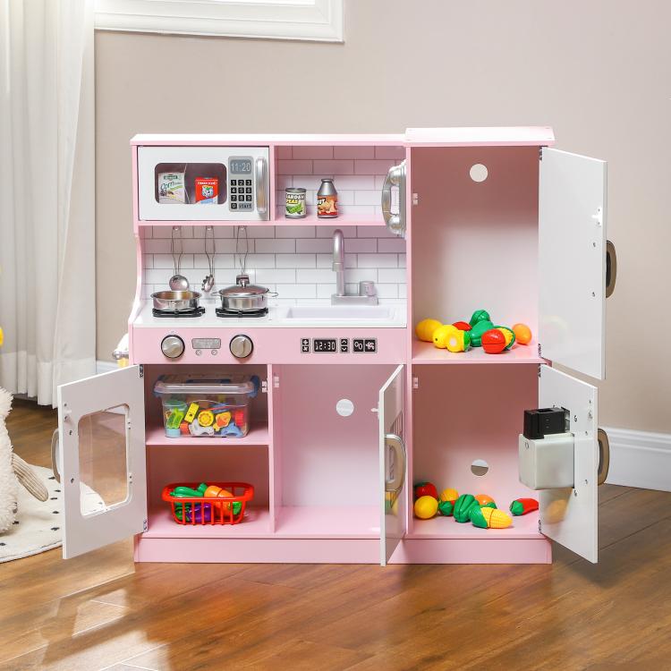 Pink kids pretend play kitchen with open storage, stove, sink, microwave and ice maker.
