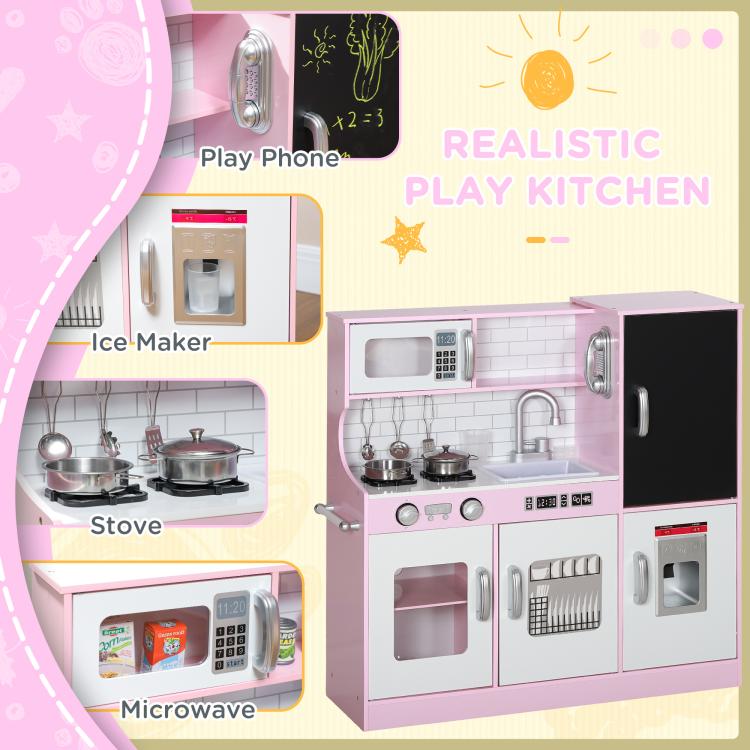 Pink kids play kitchen front view with stovetop, sink, chalkboard, and ice maker