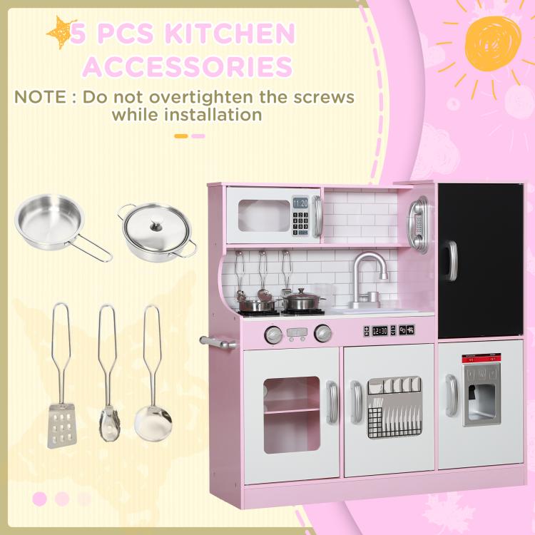 Pink kids play kitchen with included accessories: pots, pans, and utensils