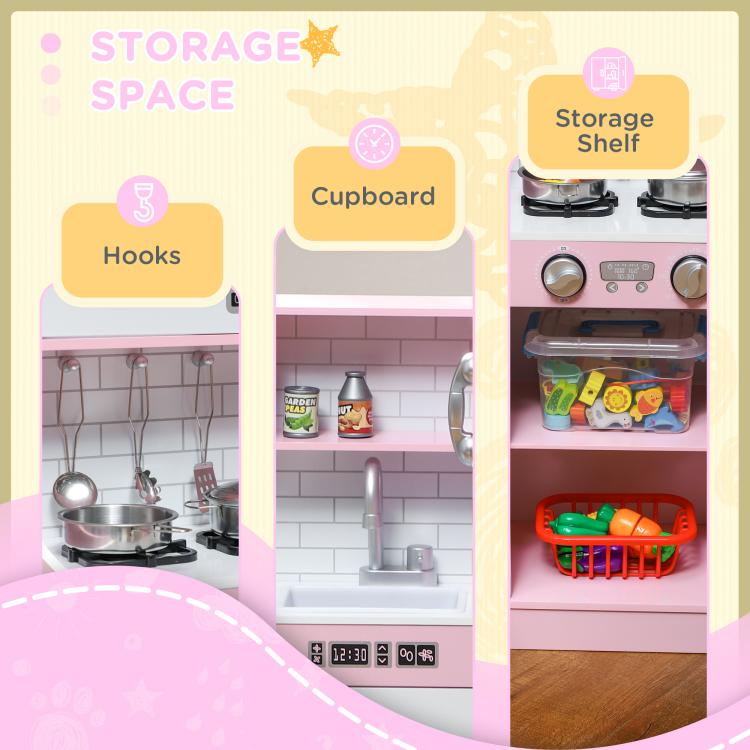 Pink kids pretend play kitchen with open storage shelf, hooks, and cupboard doors
