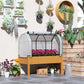 Raised garden bed planter with sand wooden frame and white mesh greenhouse cover, flowers inside