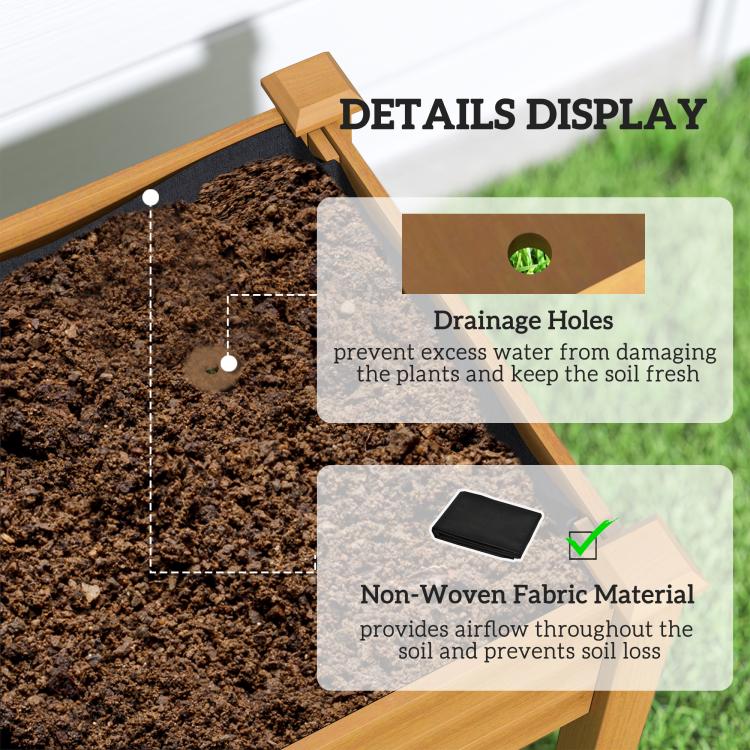 Raised garden bed planter with sand wood frame and soil bed inside greenhouse cover