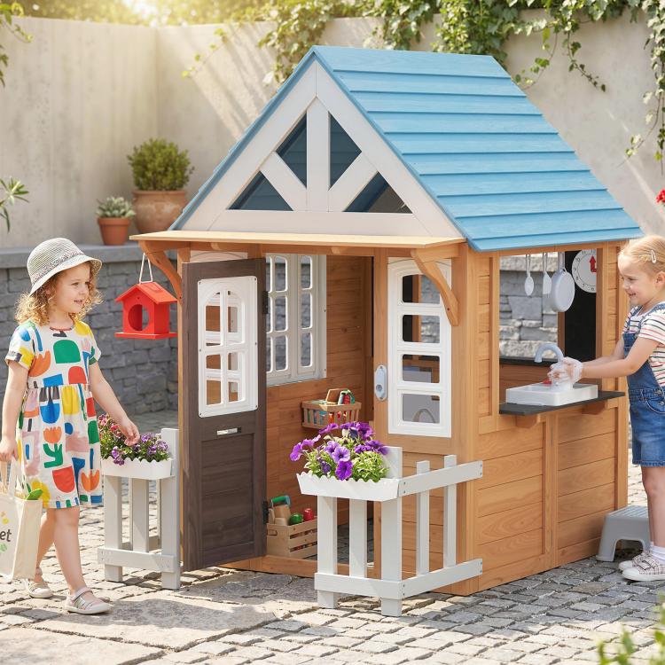 Wooden kids playhouse with blue roof, double doors, side window panels, and mailbox