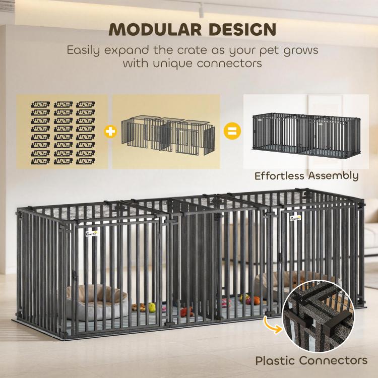 Modular dog crate setup with plastic connectors, dark steel bars and internal divider