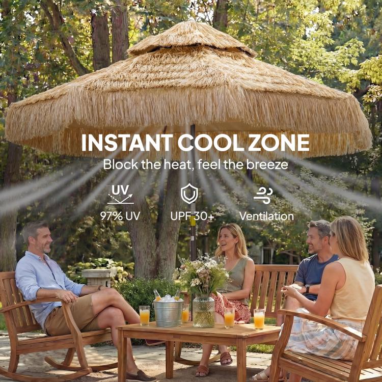 Khaki thatched patio umbrella canopy with straw fringe and black pole, open over seating
