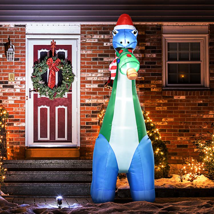 LED-lit inflatable dinosaur yard decoration with Christmas tree in mouth