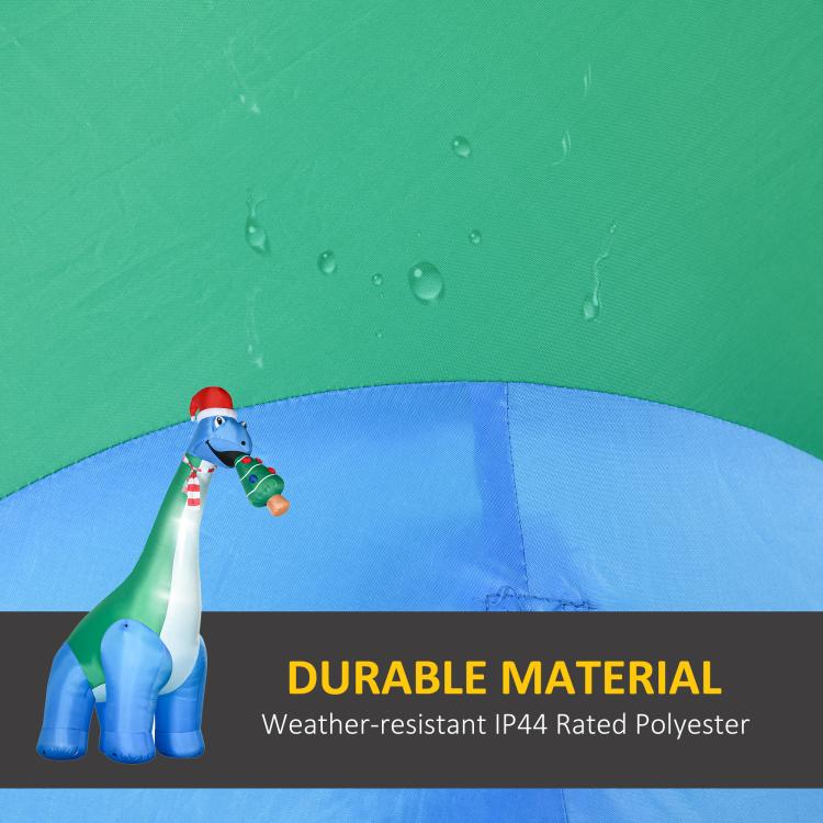 Water-resistant inflatable dinosaur with Christmas tree in mouth, durable material