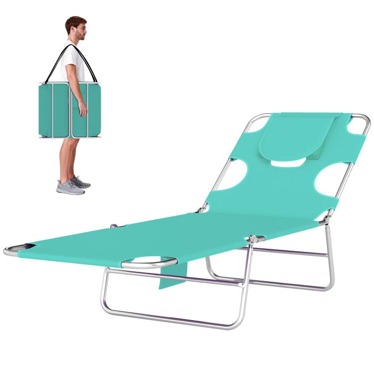 Light green folding chaise lounge chair with face pillow, arm slots, and metal frame