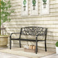 Black metal garden bench with decorative scrollwork backrest and curved armrests