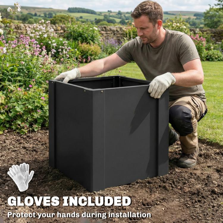 Black raised garden bed planter box with included gardening gloves during setup
