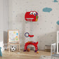Red kids basketball hoop with cartoon backboard and net, shown with play balls