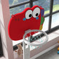 Close-up of red cartoon kids basketball hoop rim and white netting