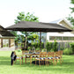Dark gray rectangular patio market umbrella standing over outdoor chairs and table