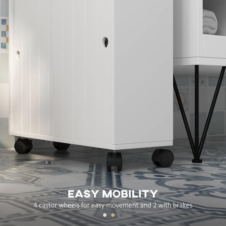 White slim toilet paper cabinet with four caster wheels and paneled cabinet doors.