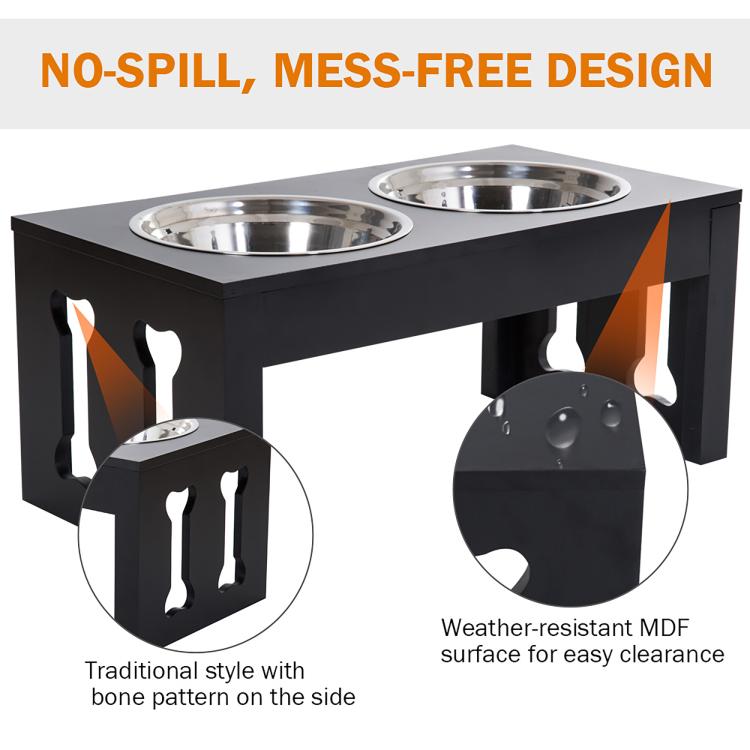 Black elevated dog feeding station with two stainless bowls and side cutouts