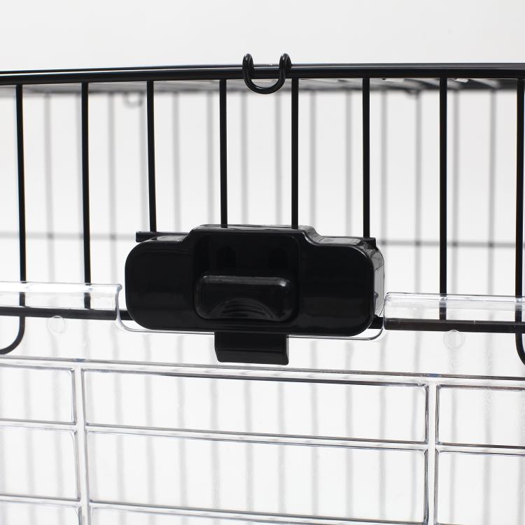 Black wire cage door latch with lock for two-level enclosure, close-up