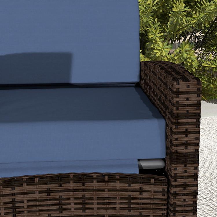 Dark blue outdoor swivel recliner chair with dark brown wicker arms and seat cushion
