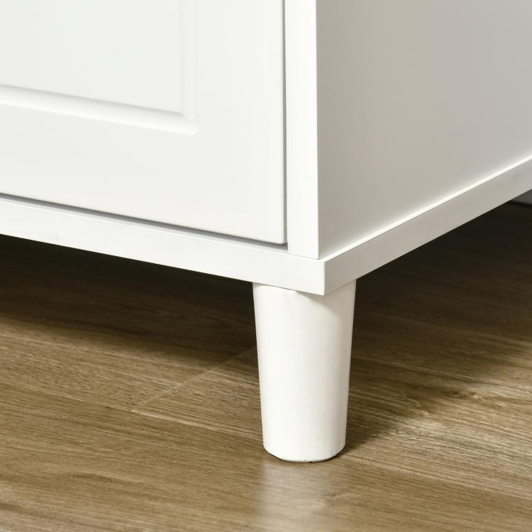 White hall storage bench leg and cabinet base, close-up