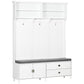 White entryway hall tree with coat hooks, open shelves, bench drawers