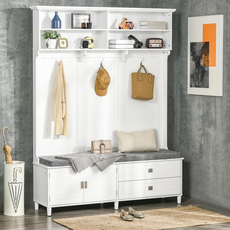 White hall tree with coat rack, shelves, and dark cushioned storage bench for entryway