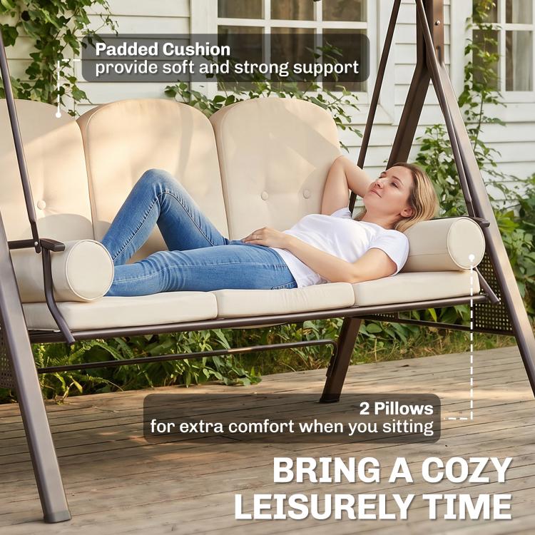 Beige 3-seat patio swing with two pillows and thick padded reclining cushions