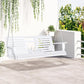 White hanging porch swing bench with slatted seat and backrest on patio