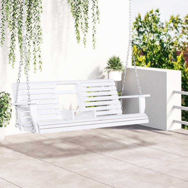 White hanging porch swing bench with slatted seat and backrest on patio