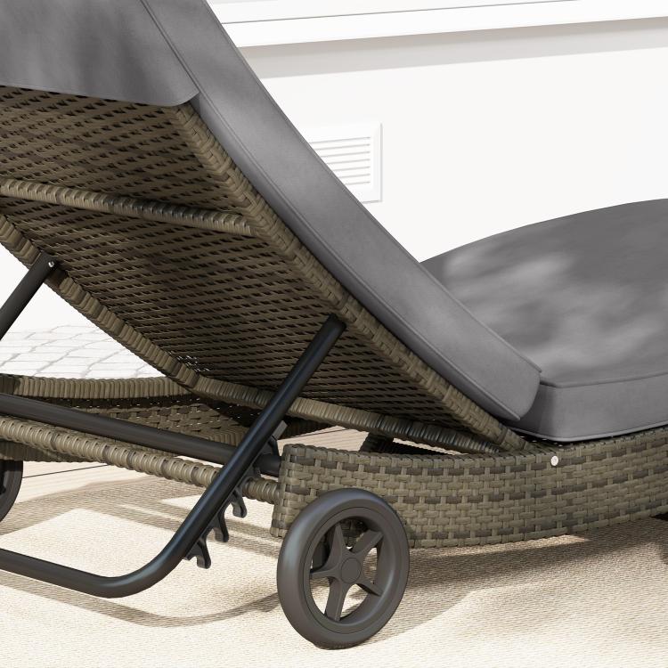 Gray outdoor wicker chaise lounge with adjustable back and two wheels, close-up