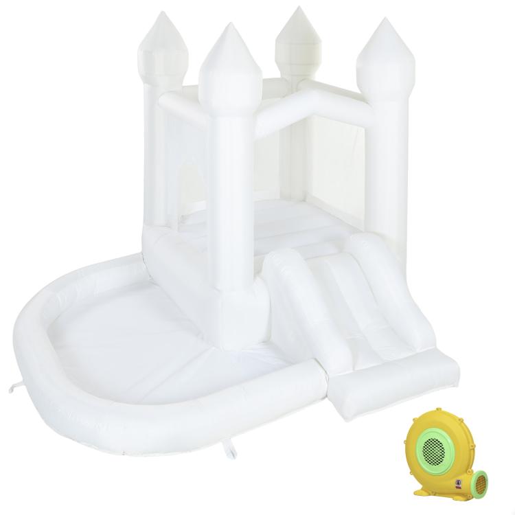 White inflatable castle bounce house with slide, towers, and yellow air blower
