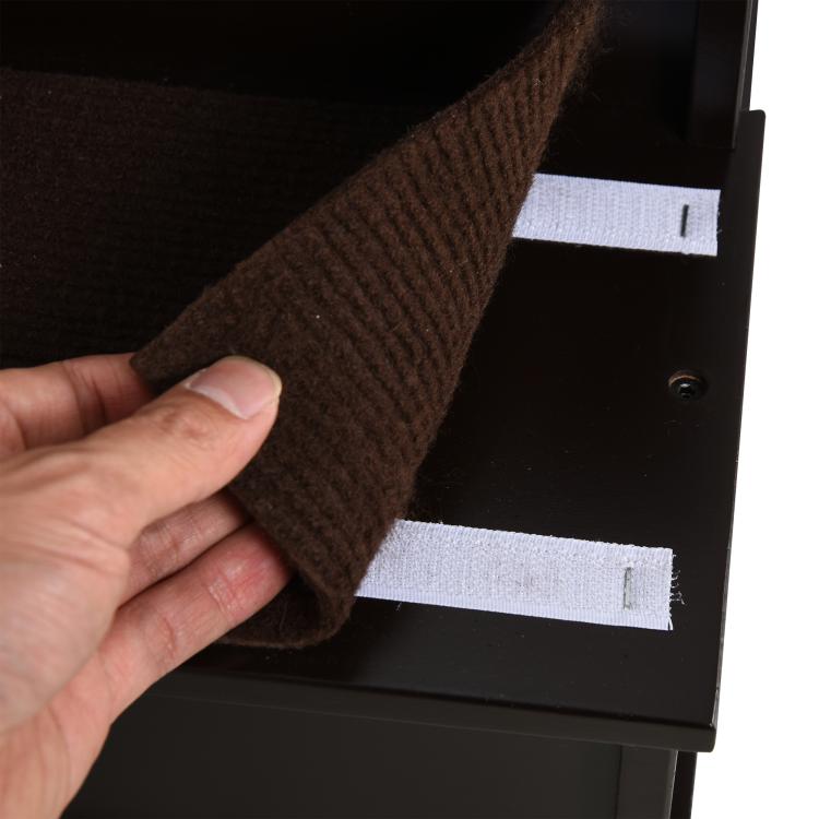Removable brown cushioned cover for pet stairs, hand lifting fabric panel