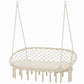 Round hanging macrame swing chair with cream cushion and long fringe tassels