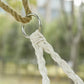 Close-up of hanging rope loop and braided cotton strand for macrame hammock chair