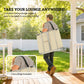 Beige folding tanning chair with face pillow and carry strap, compact for transport