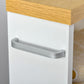 White slim bathroom cabinet door with gray recessed pull handle