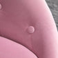 Pink round tufted swivel chair upholstery with fabric button detail