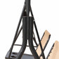 Close-up of black steel swing support legs and beige sling seat edge