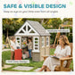 Gray wooden playhouse with multiple windows and half-door design in outdoor scene