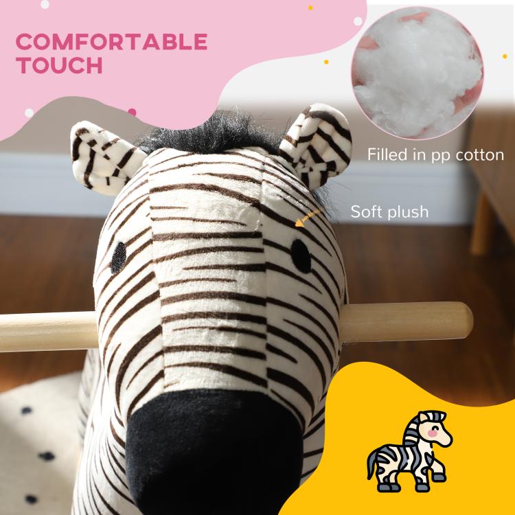 Close-up plush zebra rocking horse head with black ears and striped fabric