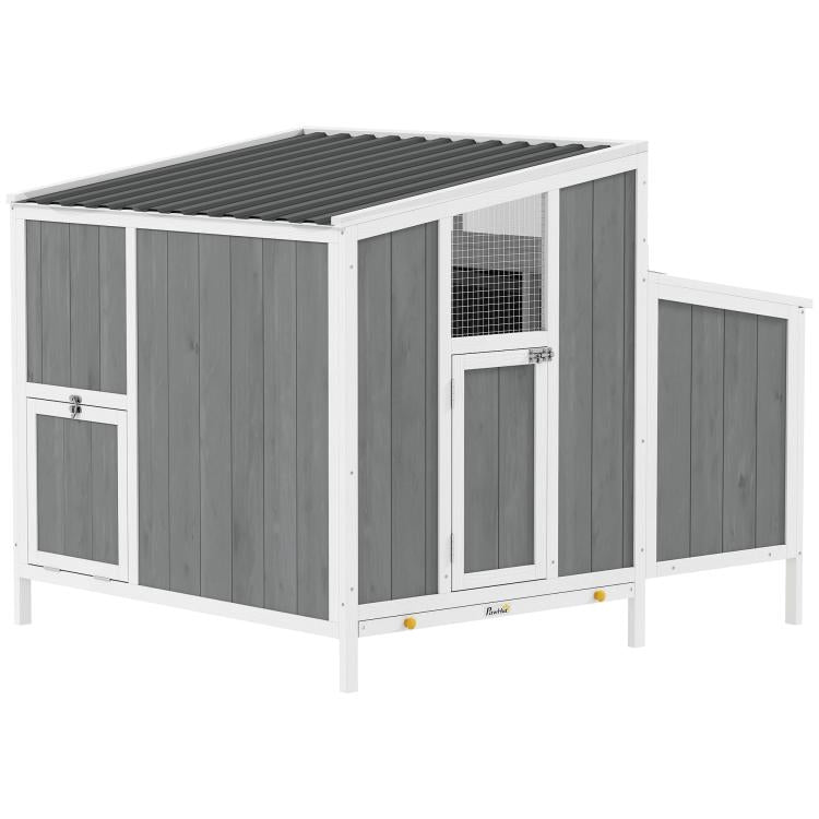 Gray and white wooden chicken coop with mesh window and side access door