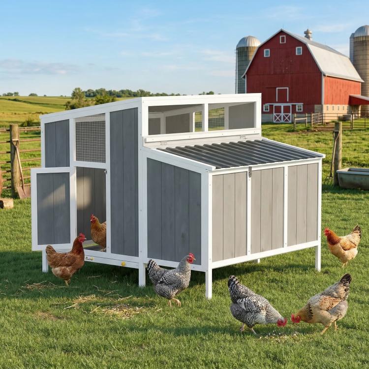 Large gray wooden chicken coop with side doors, mesh window, and slatted roof