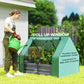 Green mini greenhouse with roll-up window opening over a dark gray raised garden bed