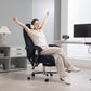 Black heated reclining office chair with footrest and padded headrest