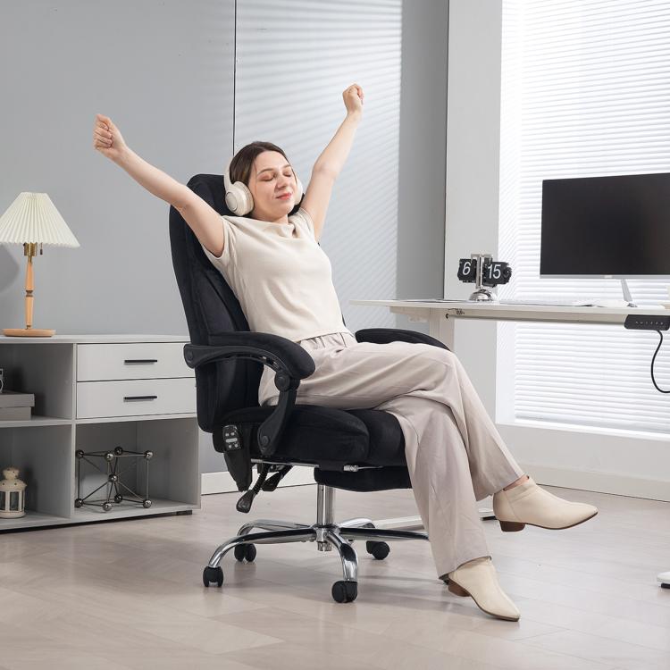 Black heated reclining office chair with footrest and padded headrest