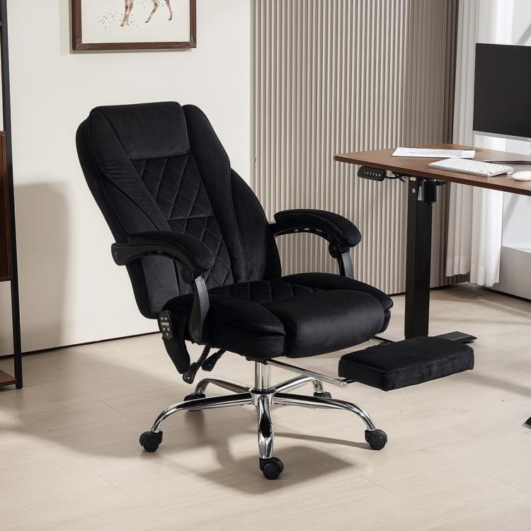Black massage office chair with recline lever and padded headrest, plus matching footrest.