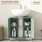 Green bathroom vanity cabinet with doors open and adjustable shelf holding bathroom items