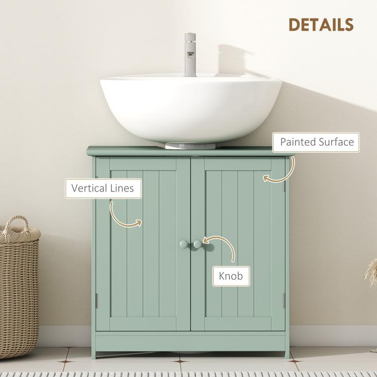 Green vanity cabinet front with painted surface, vertical panel doors, and knob hardware