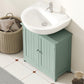 Green bathroom vanity cabinet with two doors, round knobs, and a white sink on top