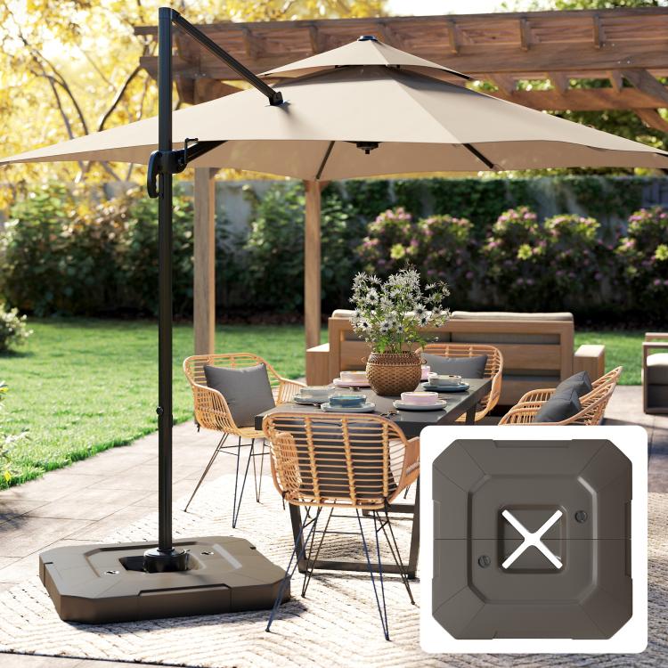 Brown cantilever umbrella base weights set with X-marked tops on patio