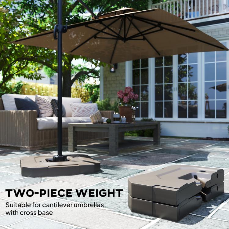Brown two-piece umbrella base weight blocks on patio beside umbrella pole